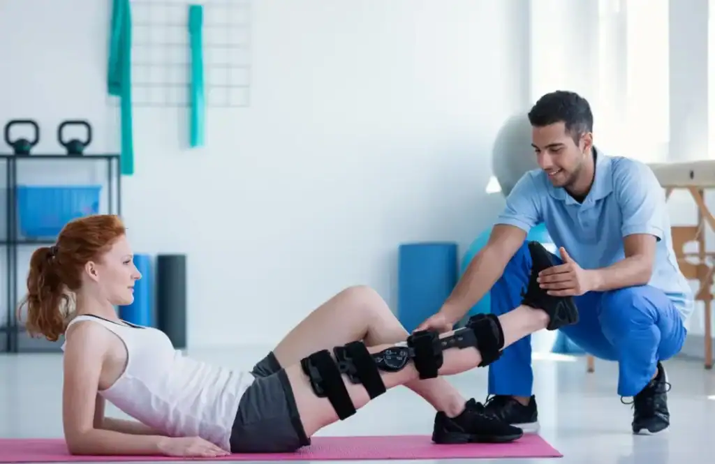 Debunking Meal Timing Myths: The Truth About Muscle Recovery 1 Woman having treatment to help muscle recovery Bexhill after an injury