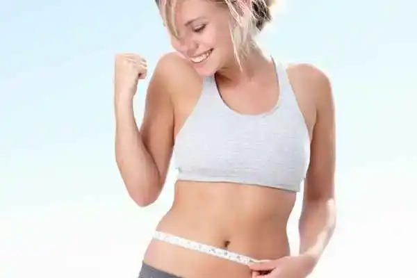 Unraveling the Mystery: Where Does the Body Fat Loss From First? 3 Image of woman happy with fat loss Bexhill