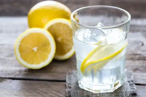 Hydration: The Secret Ingredient for a Toned Stomach and Enhanced Fitness 2 Image of lemon water to aid hydration Bexhill